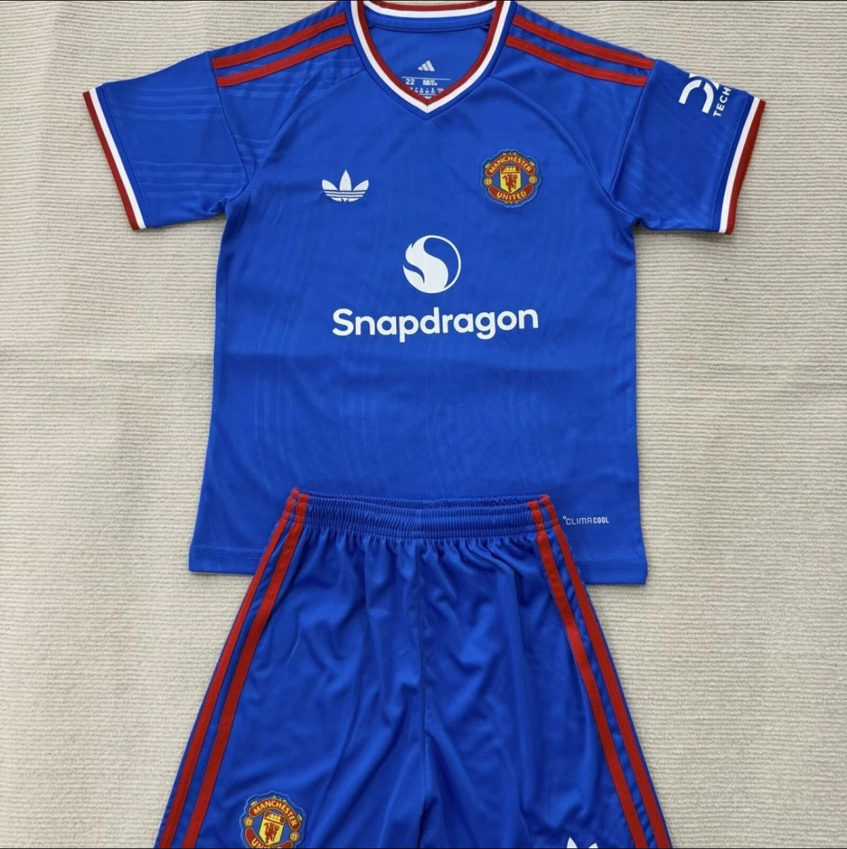 Enfants Manchester United 2026-2027 extérieur Image principale du produit